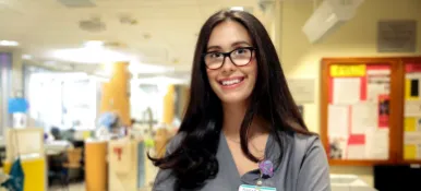 A Brown University Health nurse smiling.