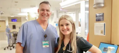 Two Brown University Health nurses smiling.