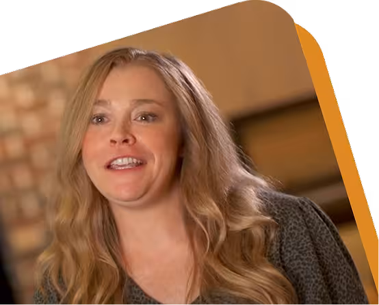 Cheddar’s Director of Operations, Cassie smiling at the camera.