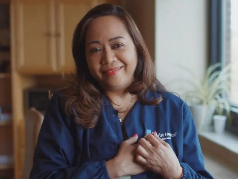 A Christ Hospital employee smiling