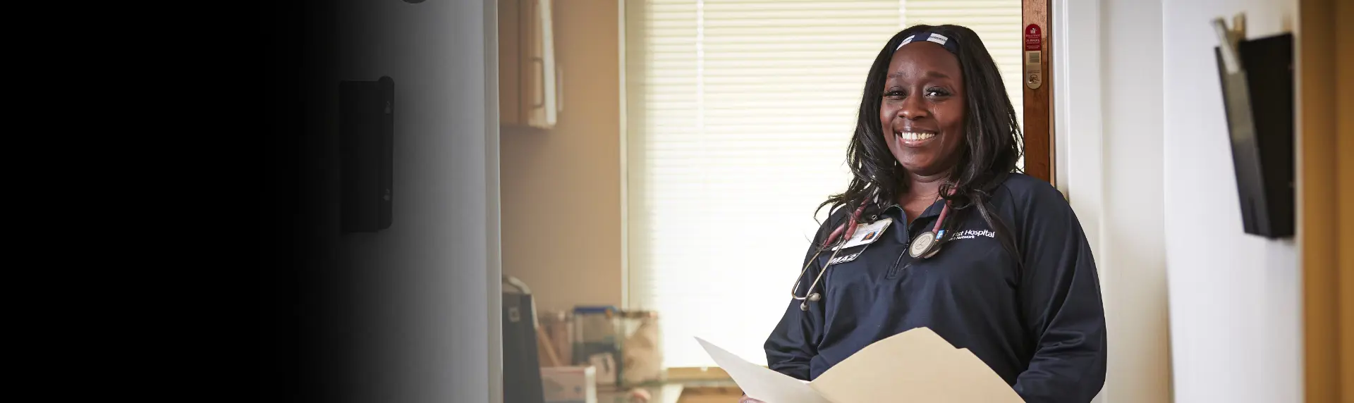  	A Christ Hospital Health Network professional concentrating as they perform surgery with the headline: 'Everything it takes so everyone can achieve'