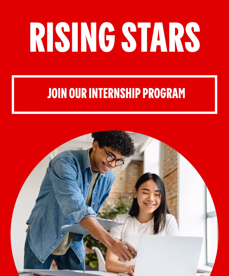 Two interns working together in an office.