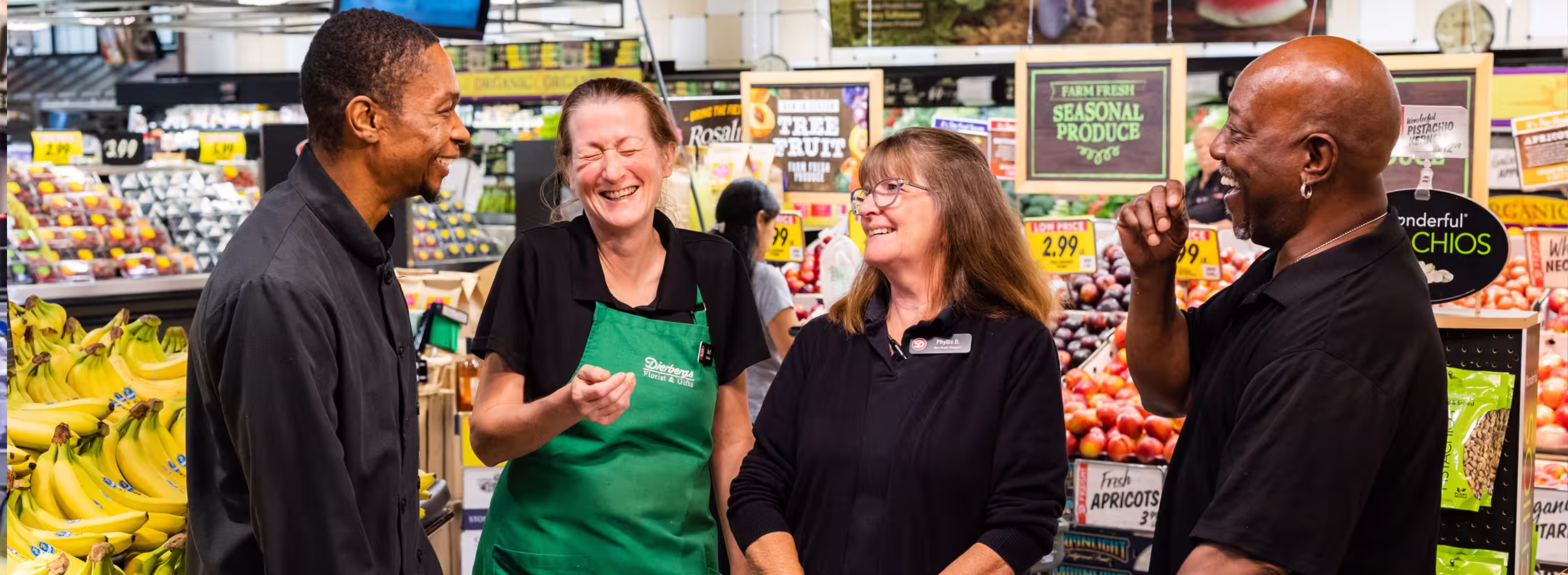Several Dierbergs managers and associates standing together and smiling