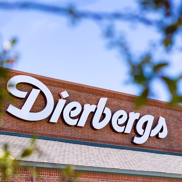 A Dierbergs employee standing outside a storefront
