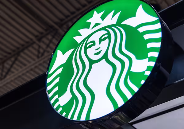 An illuminated Starbucks sign