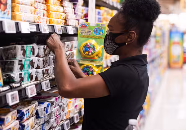 A Dierbergs employee restocking carts