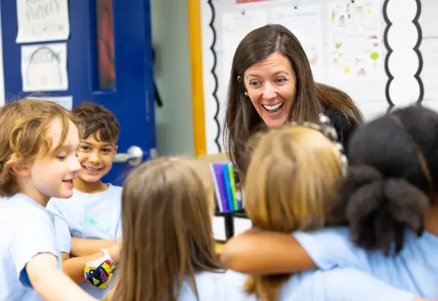 An educator with five students.