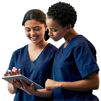 Two radiology professionals discussing information on a tablet.