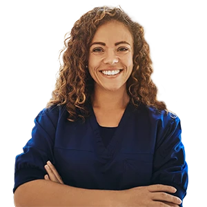 A female radiology professional smiling with her arms crossed in dark blue scrubs.