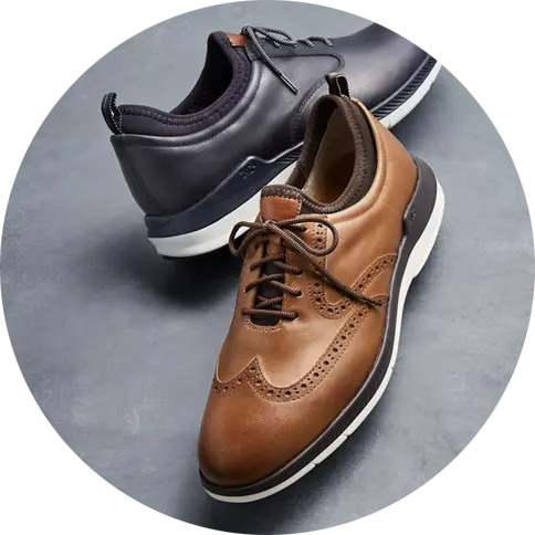 Pair of Brown Shoes and Black Shoes