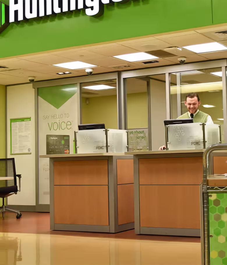 Two Huntington tellers at work