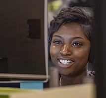 Huntington employee in front of a computer