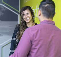 Huntington employees smiling in a meeting