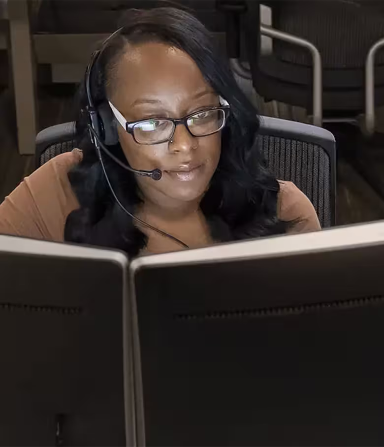 Two Huntington tellers at work