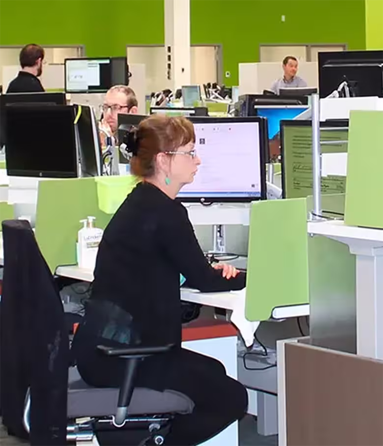 Two Huntington tellers at work