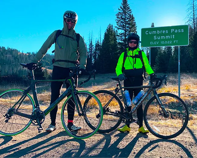 LANL employee, Dave, mountain biking with a friend.
