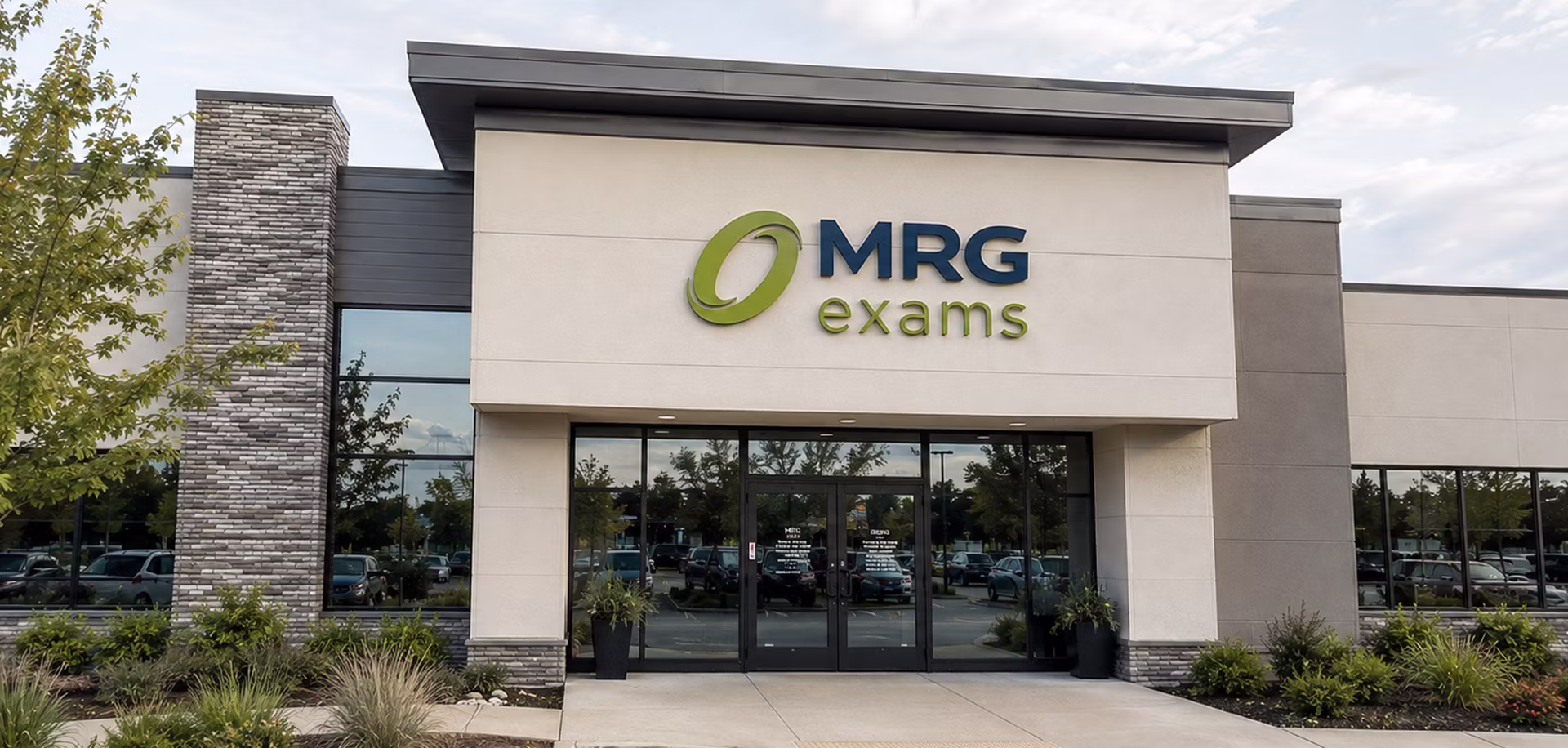 Exam room interior with MRG Exams signage on the back wall.