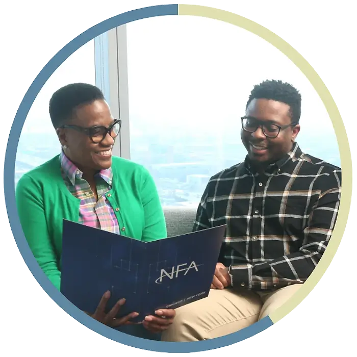Two NFA interns laughing together.