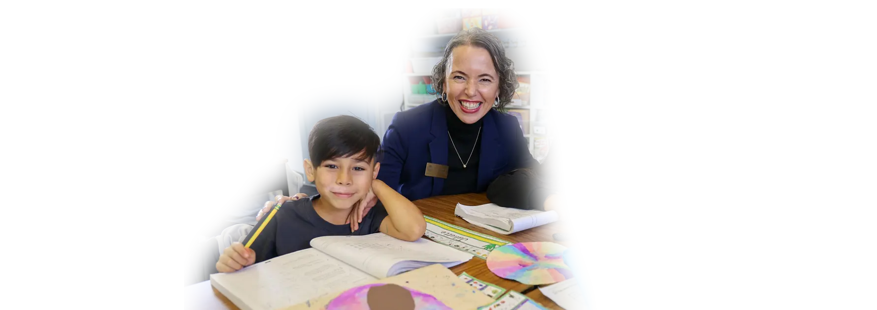 Woman smiling next to a child