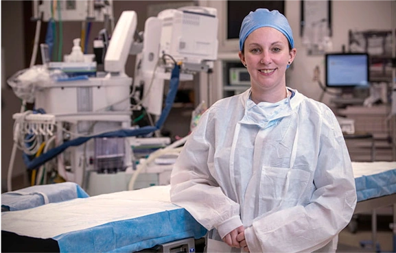 A doctor inside an operating room.