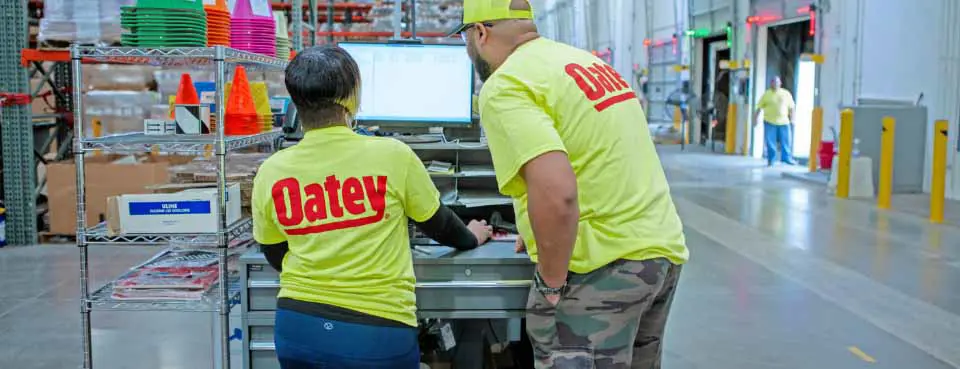 Oatey distribution employees working.