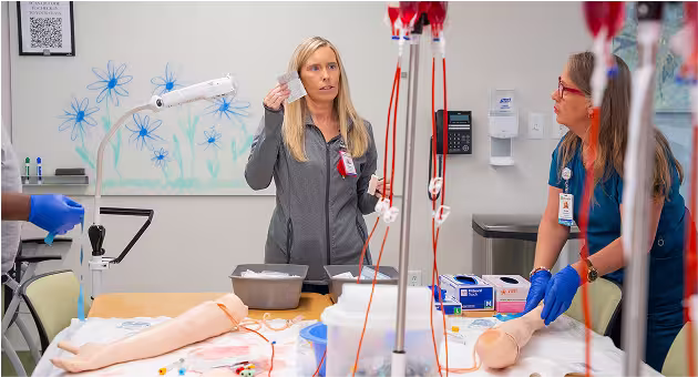 New grad RNs at Phoebe in a training session at the simulation center