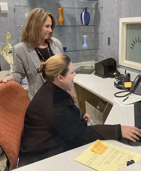 Parrish Healthcare corporate Care Partners collaborating in an office.