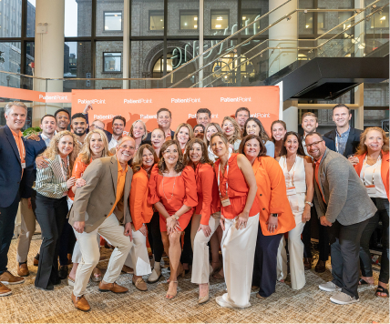 A large group of employees at a PatientPoint conference.