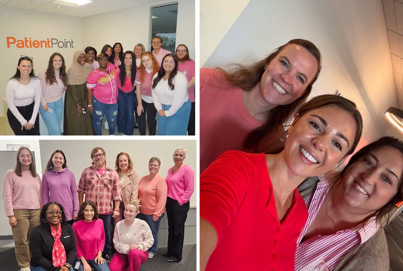 A group of women professionals standing together and smiling.