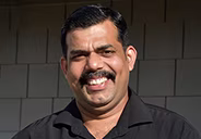 A Red Lobster team member smiling at the camera.