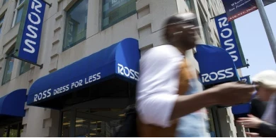 Ross Stores retail location exterior with motorcyclist riding past