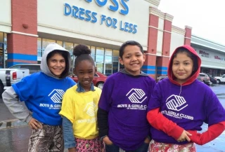 Four children from Boys & Girls Clubs of America, an organization supported by Ross