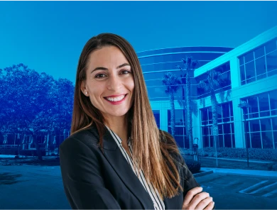 Smiling Ross Supply Corporate Associate in front of Dublin, California headquarters
