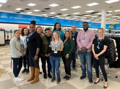 Group of eleven Ross Associates inside a store location