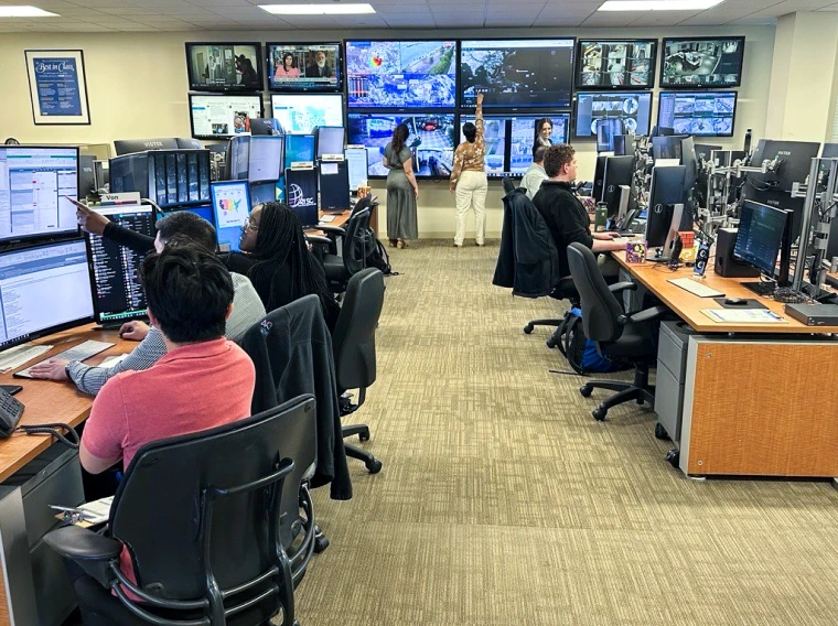 Ross Associates at a logistics center monitor and plan distribution routes