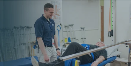 South Shore Health Allied Health employee working with a patient.