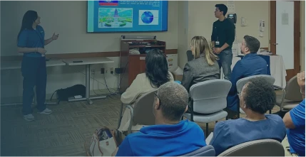 A group of South Shore Health employees attending a learning session.