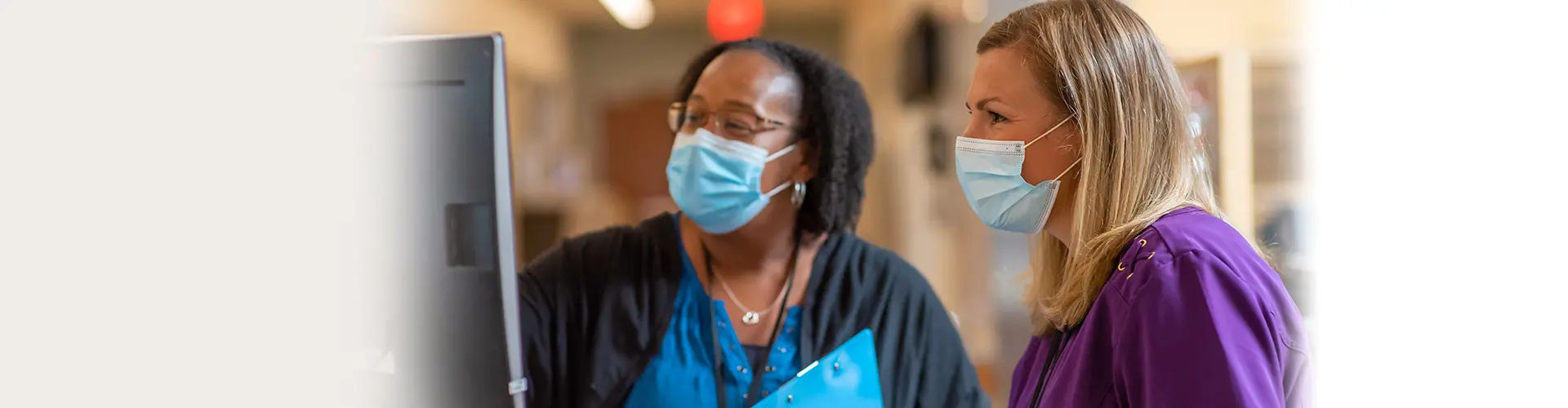 South Shore Health nurses reviewing information on a computer screen