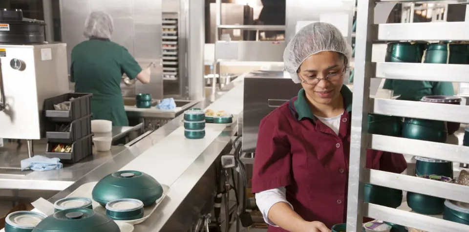 South Shore Health Nutrition and Food Services employees working in an industrial kitchen