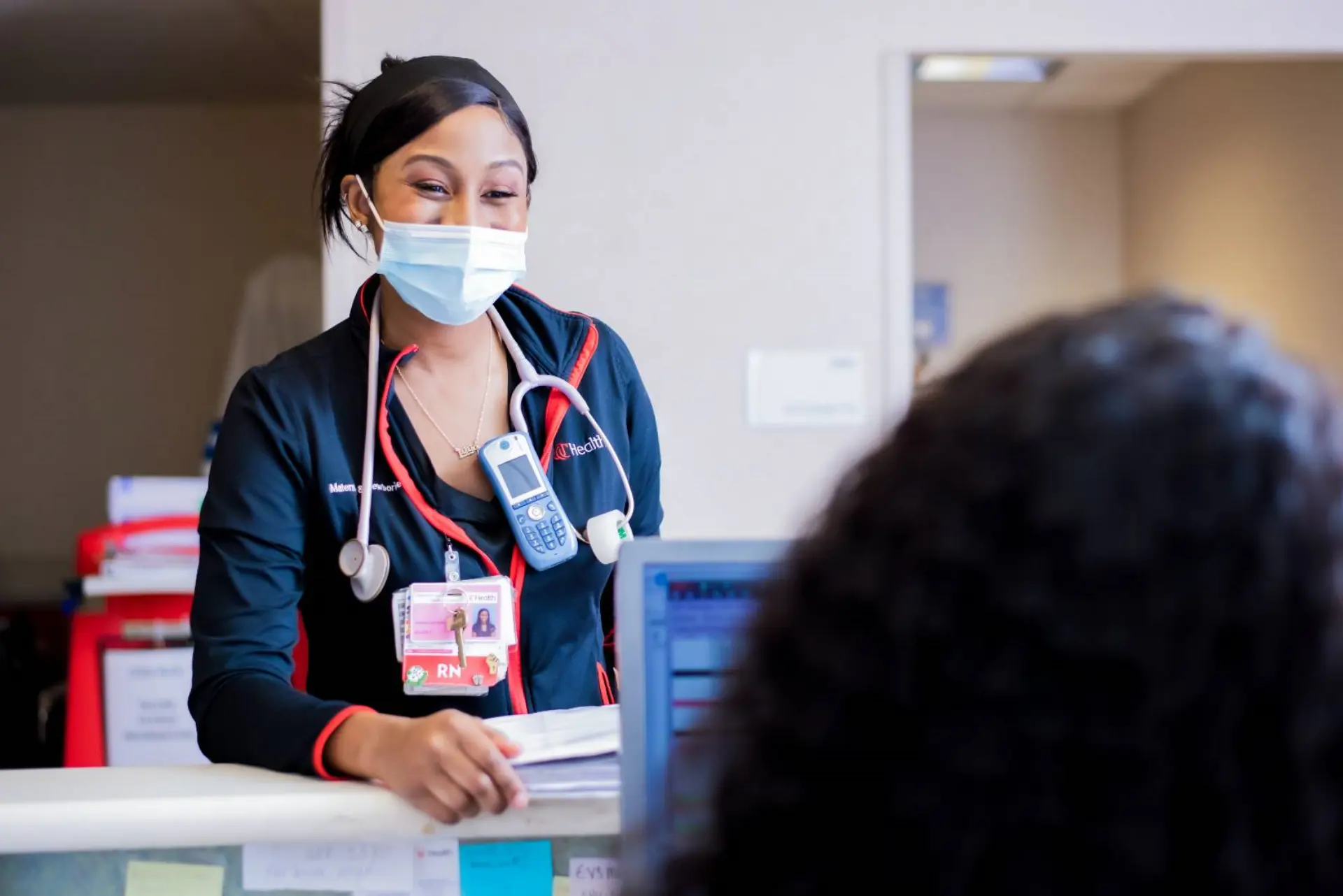 Smile Nurse Showing the faces of UC Health Being Extraordinary