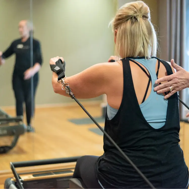 A female employee exercises as part of her work/life balance.