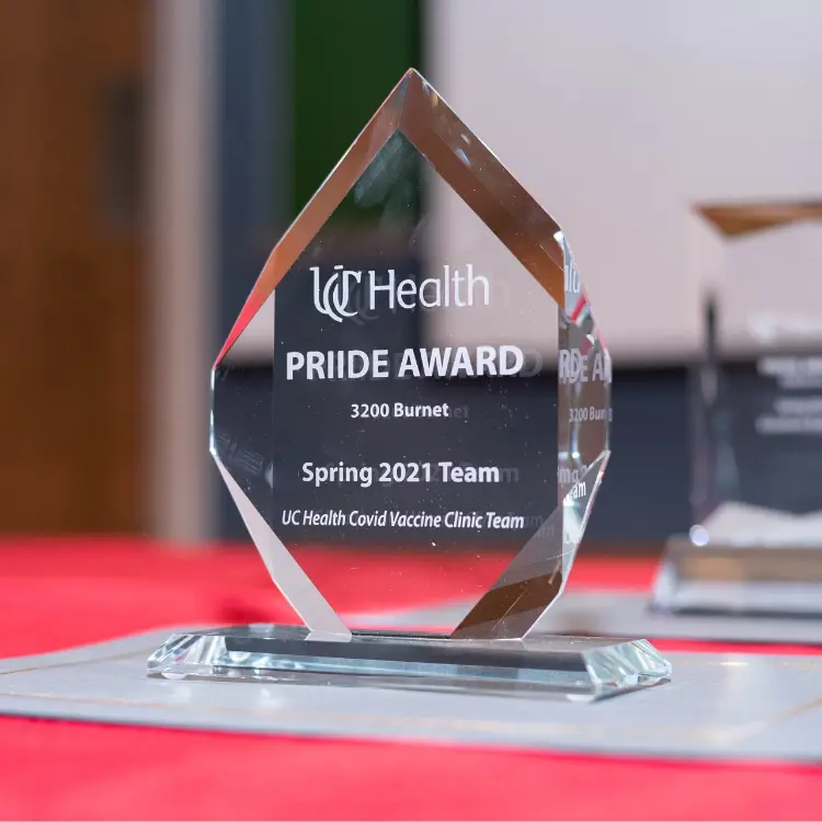 PRIIDE Rewards logo  Recognition  Spring 2021 Team UC Health Covid Vaccine Clinic Team