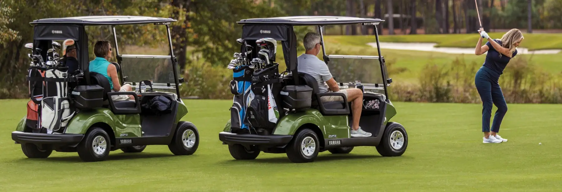 A group of golfers in Yamaha golf cars enjoying a day on the course.