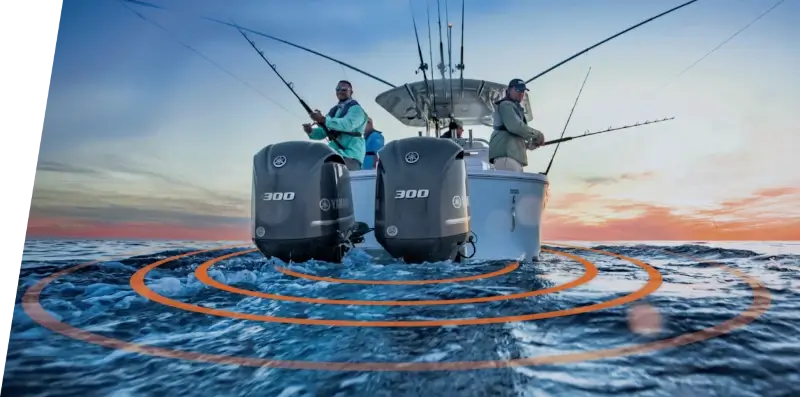 Two people fishing off a watercraft equipped with Siren Marine remote monitoring boat technology.