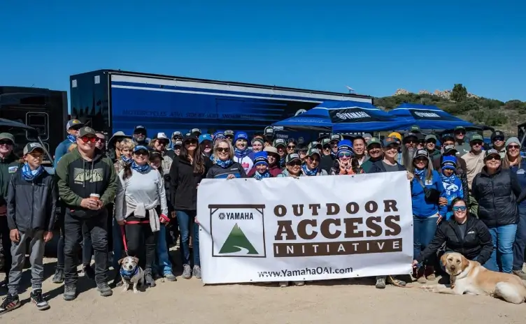 A large group of Yamaha employees at an Outdoor Access Initiative event.