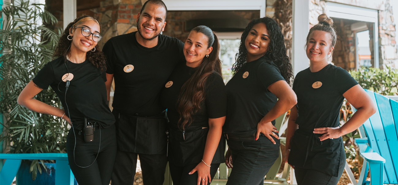 A group of Bahama Breeze employees smiling
