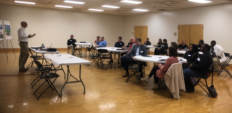 Group of Barge employees listening to a presentation