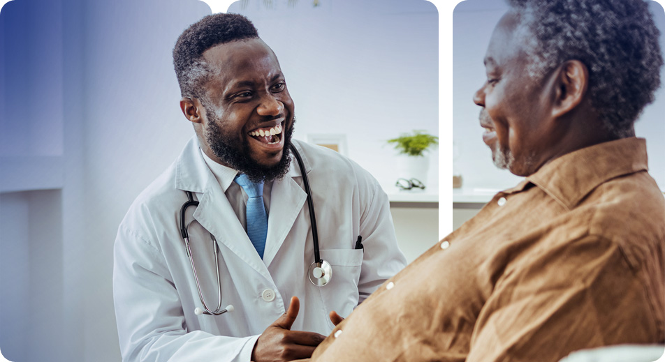 Votion physician laughing with a patient.