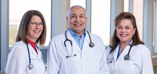 Three smiling Bon Secours Mercy Health physicians