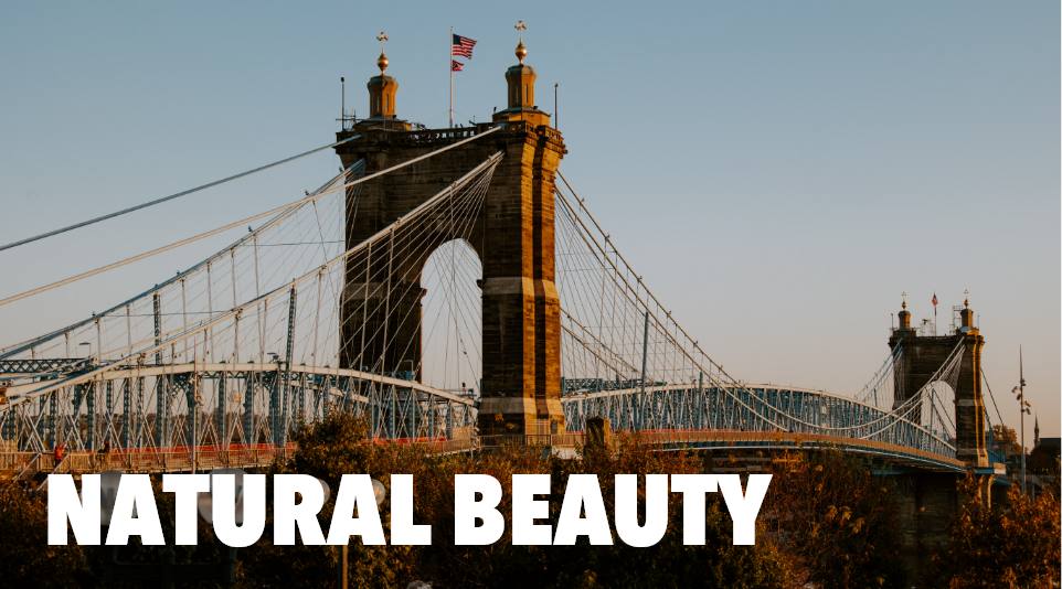 A view of the Cincinnati bridge with the text “Natural Beauty”